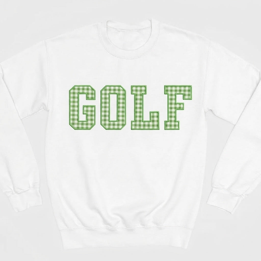 White sweatshirt with 'GOLF' in green checkered letters on a white background